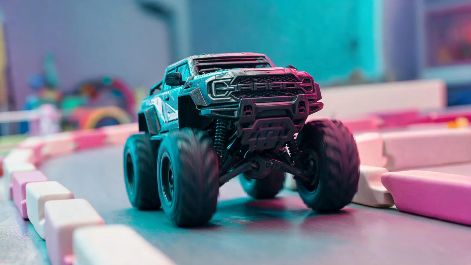 Arrma RC truck on a colorful indoor test track